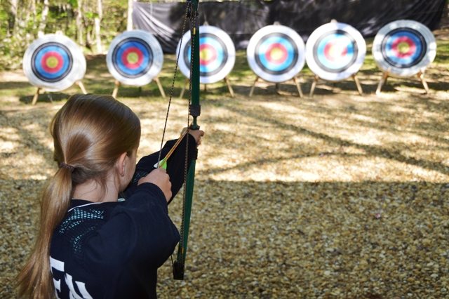 Archery class among the trees at Riverview