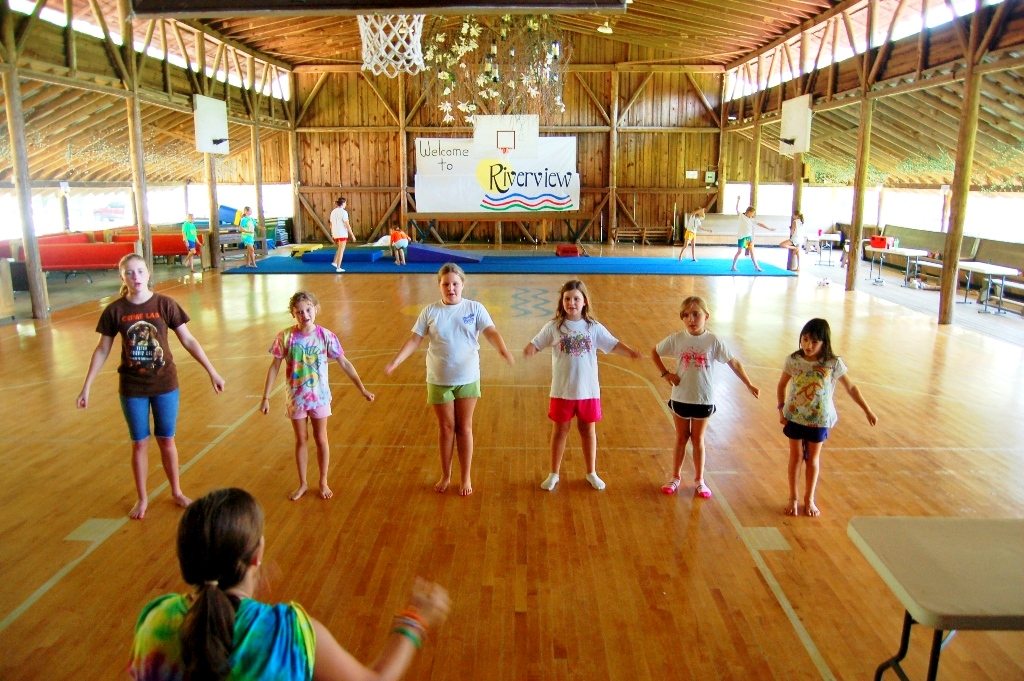 A dance class rehearsing a routine